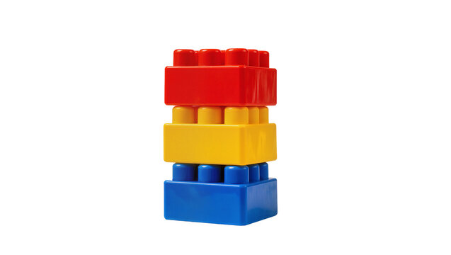 Isolated three colorful building blocks stacked vertically, classic interlocking children's toy bricks for play