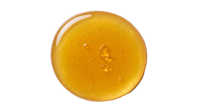 Isolated glistening golden viscous liquid drop, shiny reflection, and tiny air bubbles