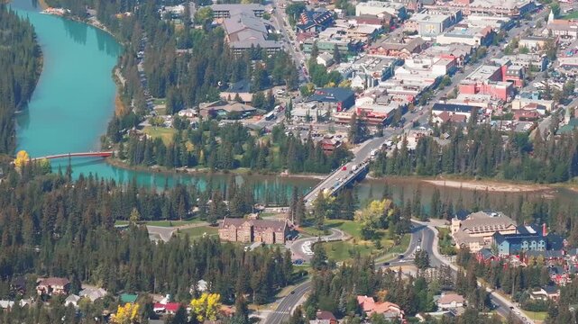 Aerial Revealing shot, Town of Banff, Morning shot. Banff National Park, Alberta, Canada.