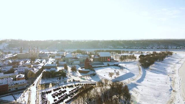 Kaunas castle and oldtown on sunny winter day, aerial drone view