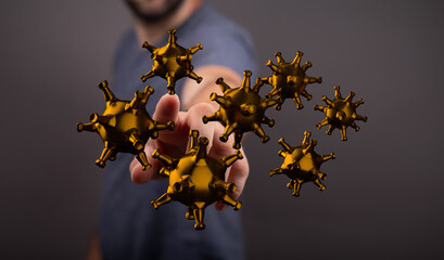 Conceptual image of a hand interacting with virus models. Symbolizing health, disease, prevention,...