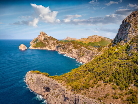 Wonderful summer view of popular tourist attraction - Es Colomer. Breathtaking morning seascpae of Balearic Sea. Spectacular landscape of Mallorca Island, Balearic Islands, Spain, Europe.