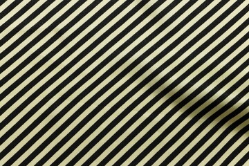 Fototapeta premium Yellow and black diagonal striped satin fabric pattern background