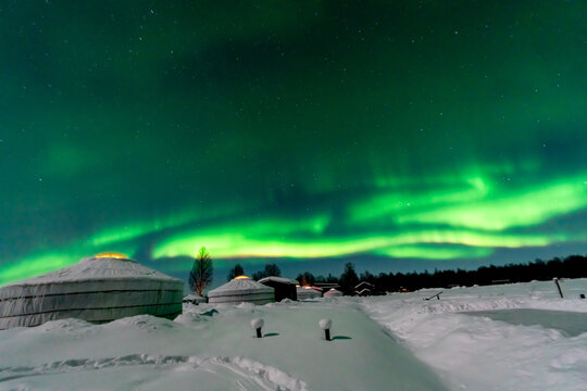 winter landscape with snow and northern lights