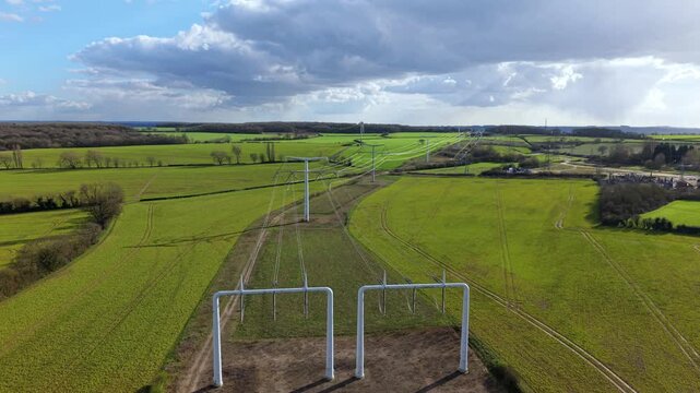 Aerial view of T-pylon and high voltage lines at Eakring training centre UK