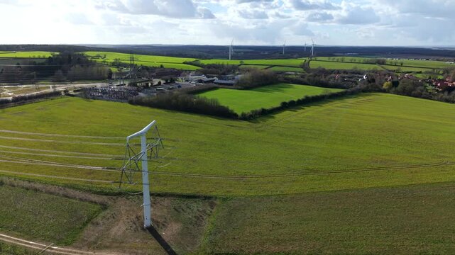 Aerial view of T-pylon and high voltage lines at Eakring training centre UK