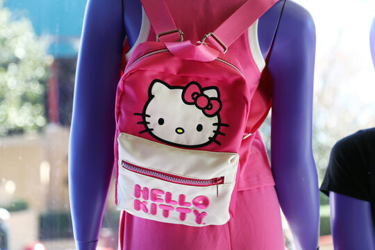 Hello Kitty pink backpack on mannequin display in retail store