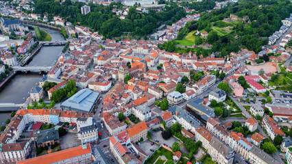 Obraz premium Aerial view of the old town above the city of Épinal in France, on a sunny spring day.