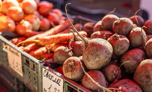 A pile of fresh organic beetroots for sale at the local vegetable market.