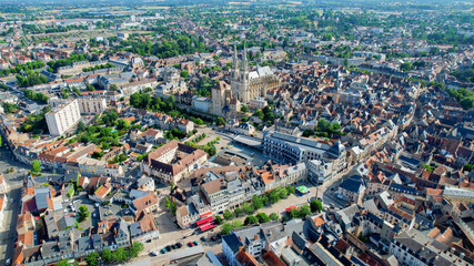 Fototapeta premium Aerial view of the old town above the city of Moulins in France, on a sunny spring day.