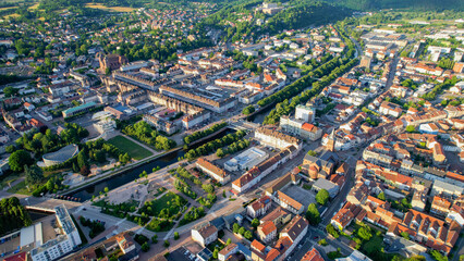 Fototapeta premium Aerial view of the old town above the city of Saint-Die-des-Vosges in France, on a sunny spring afternoon.