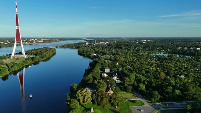 Scenic Flight Over Green Park and River on Sunny Summer Day