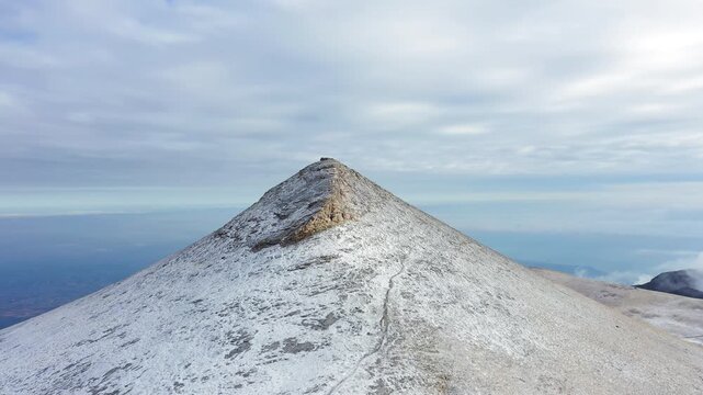 Profitis Ilias Summit Mount Olympus Greece high altitude frost snow covered, aerial drone