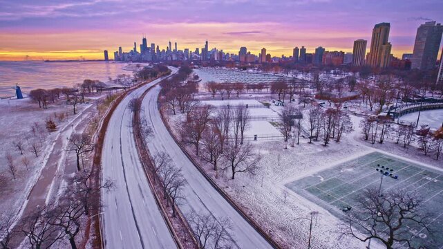 Drone shot revealing downtown Chicago&rsquo;s Loop at the start of a winter day.