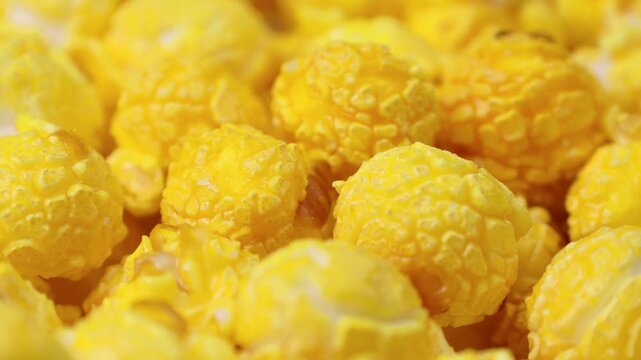 Yellow cheese popcorn circle rotation close up