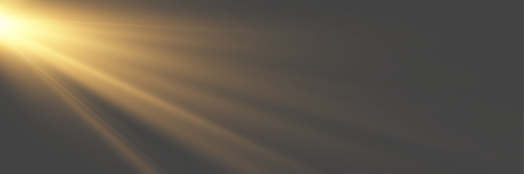 Cinematic anamorphic golden lens flare with soft volumetric glow on dark
