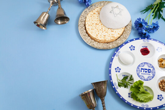 Passover seder plate with matzah and kippah for jewish holiday