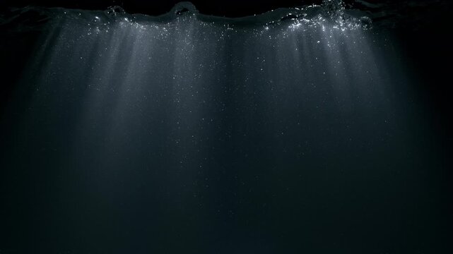 Super Slow Motion of Underwater Sun Rays Shimmering Through Dark Water at 1000fps.