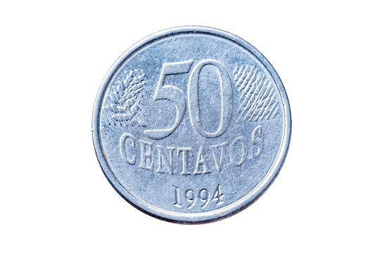 Brazilian 50 centavo coin closeup, steel texture national symbols visible, Money and everyday economy, national identity, financial savings, numismatic detail circulating currency, collecting hobby