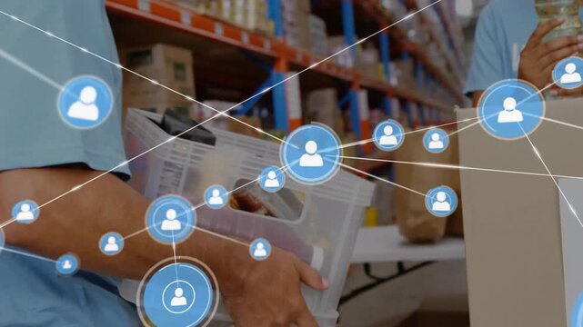Man with bin walking aisle sparking network nodes while volunteers sorting donation for teamwork