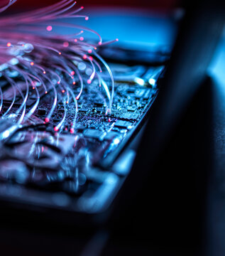 Fibre optics carrying data into a laptop computer