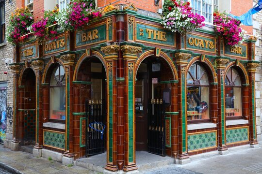 DUBLIN, IRELAND - JULY 5, 2024: The Quays Bar, one of pubs in Temple Bar district of Dublin, Ireland.