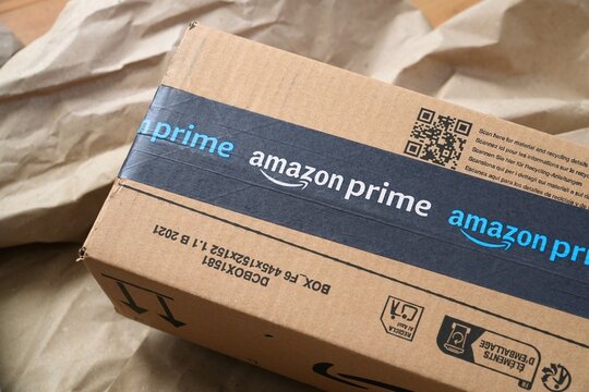 WARSAW, POLAND - MARCH 3, 2026: Amazon Prime online shopping order delivered package cardboard box in Europe.