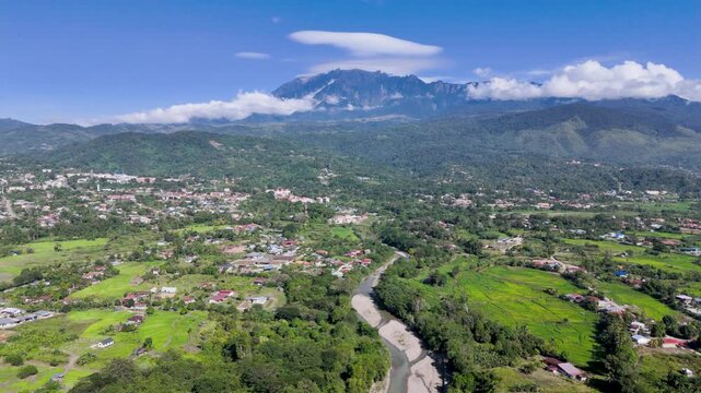 Aerial View of Mount Kinabalu, Liwagu river and Paddy Field in Ranau, Sabah, Malaysia
