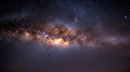 Obraz premium Milkyway galaxy core glowing cosmic dust concept of infinite mystery and human curiosity close up dark space theme surreal double exposure desert night sky backdrop.