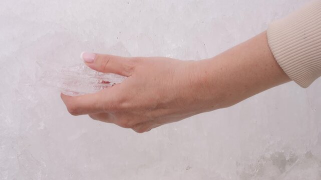 Sensory winter concept touch of snow and ice cold texture feeling touch detail touch interaction with nature minimalism scene tactile perception frozen surface calm atmosphere macro view texture