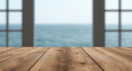 Natural light and blurred ocean visible through window behind wooden plank table copy space
