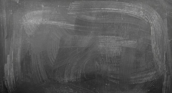 grey textured background with distressed chalkboard effect and copy space