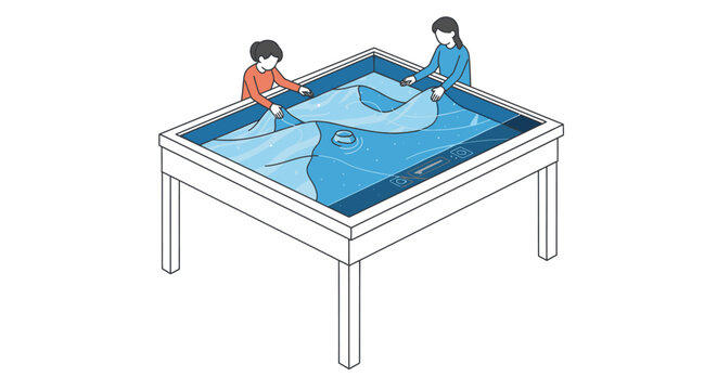 Two people interact with an innovative augmented reality sandbox table, shaping dynamic digital landscapes for educational play and learning.