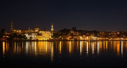 Obraz premium Nighttime river scene illuminated by crescent moon for Eid al Fitr celebration