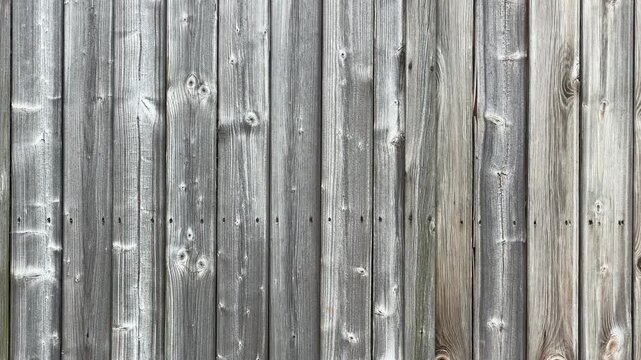 Faded silver wood vertical fence texture panning