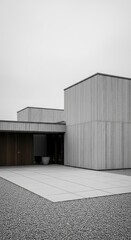 Fototapeta premium Modern architectural design, minimalist building exterior, concrete facade, geometric shapes.