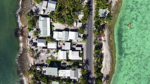 Kiribati South Tarawa Overpopulation Atoll Capital Gilbert Islands Oceania Pacific Thin Strip Aerial Drone 4K