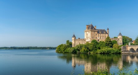 Fototapeta premium Historic Castle Site Overlooking Serene Waterbody