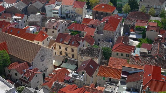 Traditional Mediterranean houses with red clay tile roofs.