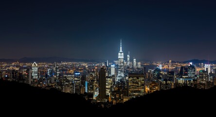 Fototapeta premium Nighttime panorama of a vibrant city skyline