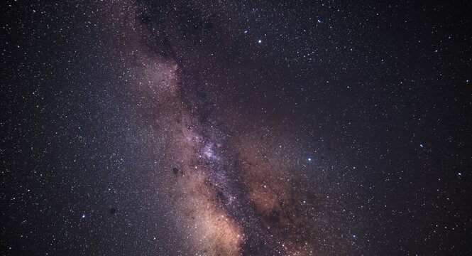 Astrophotography of the Milky Way galaxy with vivid star clusters and distant nebulae