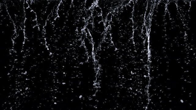 Super Slow Motion Shot of Falling Water Isolated on Black at 1000fps.