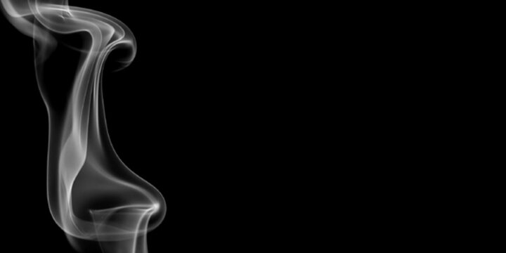 Elegant vertical white smoke wisp isolated on black background with copy space