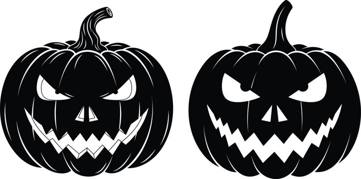 Two spooky black pumpkins with glowing eyes and sharp teeth
