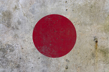 Japan national flag painted on textured wall mural background © Cristian Valderas
