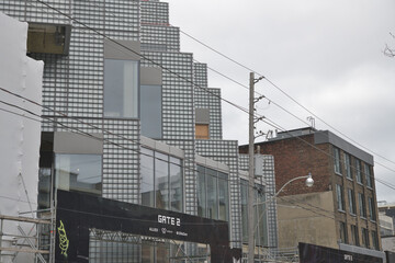 Naklejka premium construction of King Toronto, a condominium complex designed by Bjarke Ingels Group (Denmark) at 489 King St W