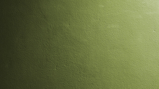 A picture shows the surface roughness of a textured plaster wall painted olive green, with lighting fluctuations.