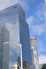 Naklejka premium skyward glance of RBC WaterPark Place with corporate skyline logo and construction of SkyTower Pinnacle One Yonge, Toronto