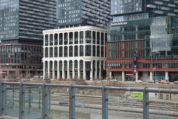 Naklejka premium exterior building facades and signs at The Well of PointClickCare and Sweat and Tonic (among others) 8 Spadina Av and 486 Front St W, Toronto