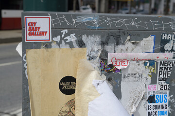 Naklejka premium Cry Baby Gallery sticker on a grungy Canada Post grungy relay box, Toronto
